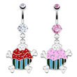 Jeweled belly ring with dangling cupcake and crossbones